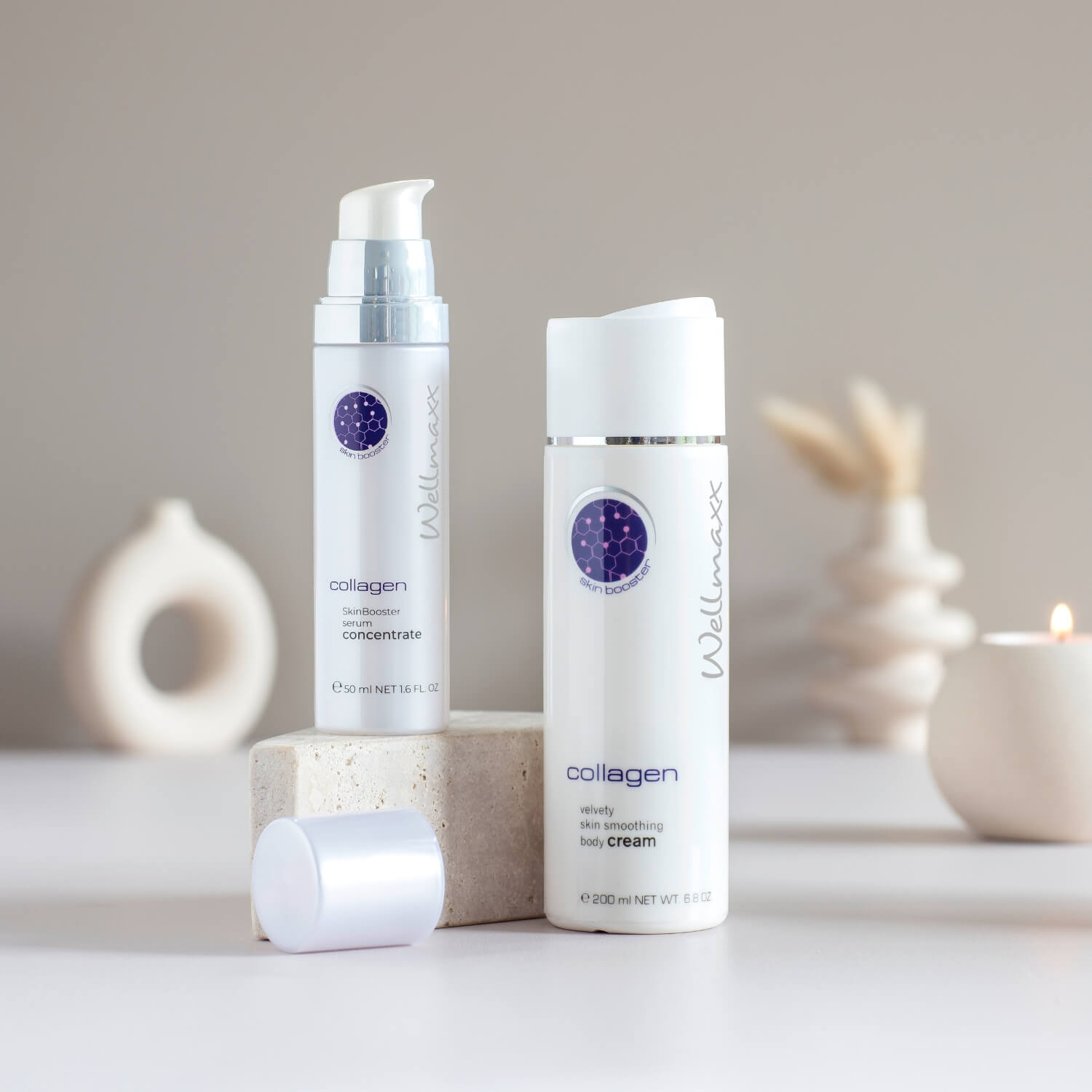 WELLMAXX Pflegeprodukte der Serie collagen dekorativ arrangiert.